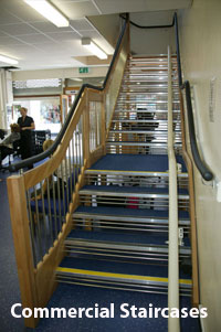 European Style Staircase + Continuous Handrail in a commercial property