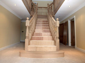 Prescott Flaired Staircase with wreathed handrails